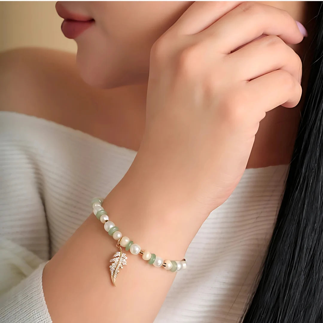 Pulsera Pluma Perlas (Rosada/Verde)