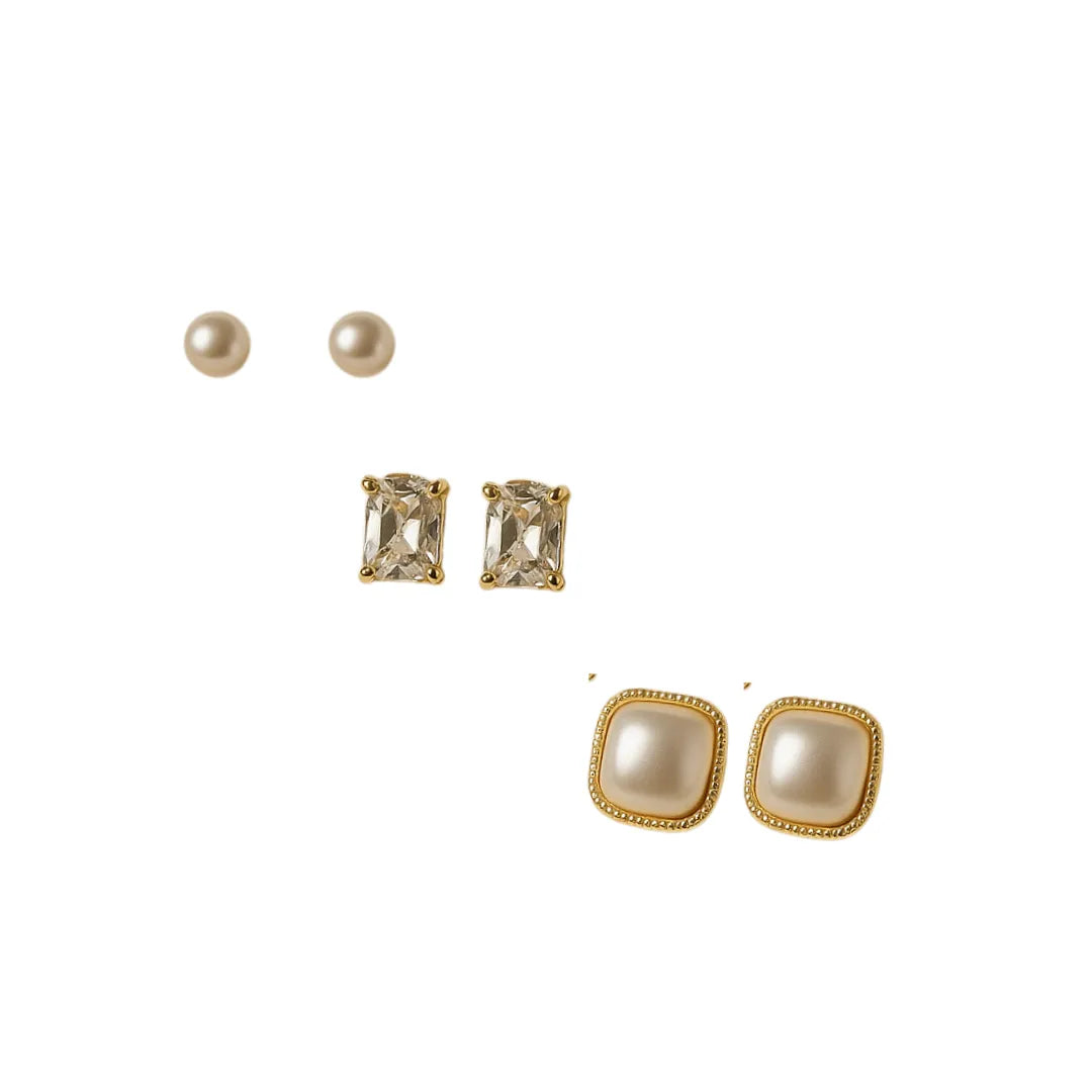 Vista superior de set completo de topitos dorados y perlas colombianas