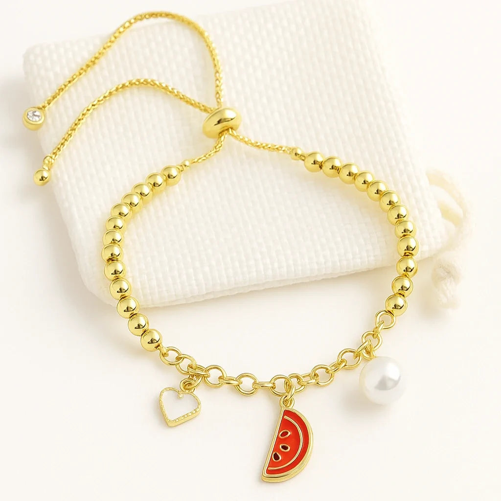 Brazalete sandía con dije de fruta y perla decorativa