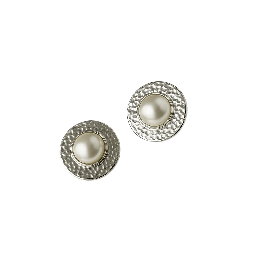 Vista frontal de aretes circulares con textura galáctica y brillo

