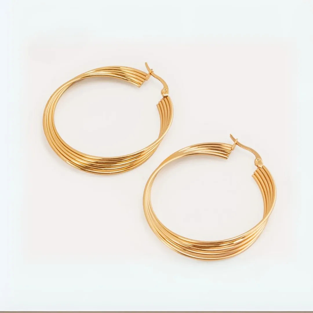 Candongas doradas Multilínea con hilos entrelazados en acero inoxidable, accesorios para mujer de estilo moderno.