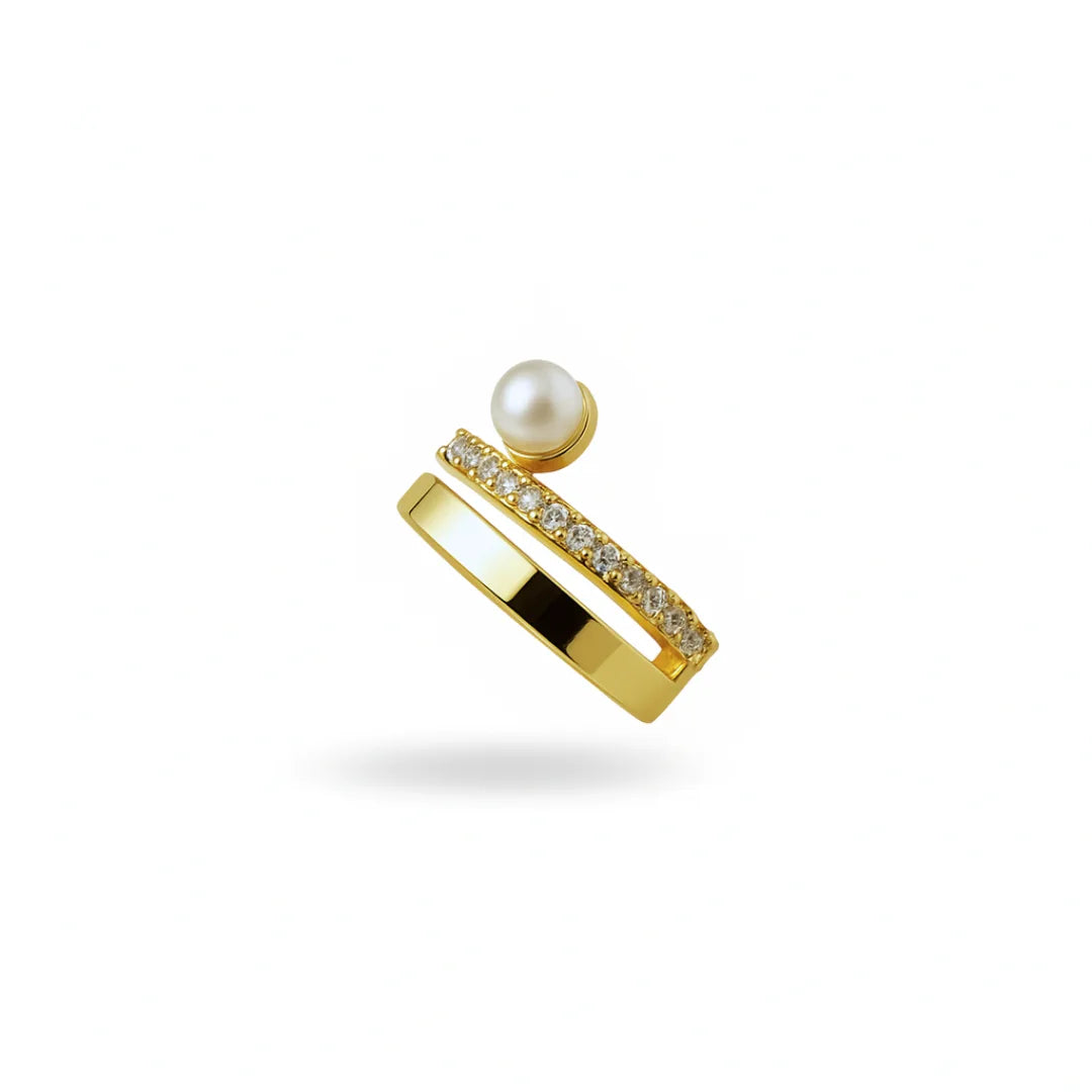 Ear cuff dorado con perla visto de perfil

